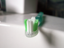 toothbrush on the edge of sink