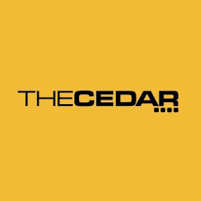 the cedar - text logo on yellow background